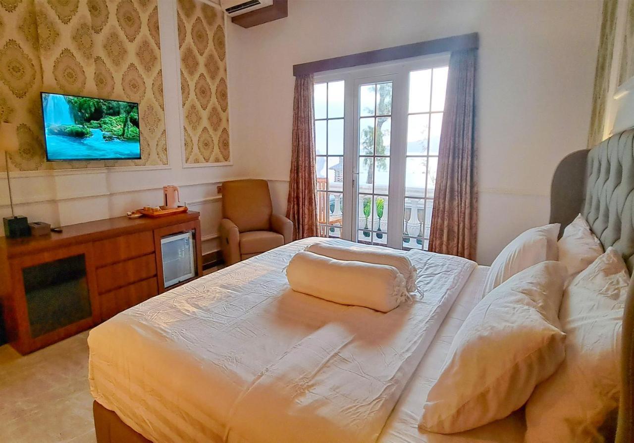Gili Beachfront Suites Гили Траванган Экстерьер фото
